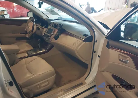 2011 Toyota Avalon Limited z USA, uszkodzony, nr VIN 4T1BK3DB2BU440079